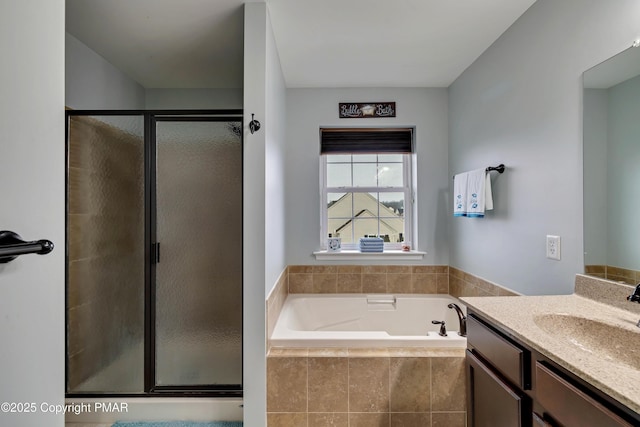 bathroom featuring independent shower and bath and vanity