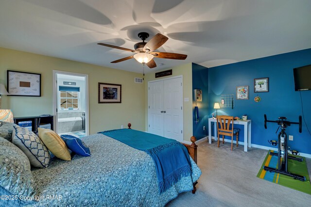 carpeted bedroom with a closet and ceiling fan