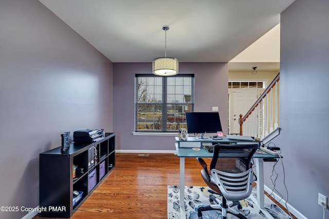 home office featuring hardwood / wood-style flooring