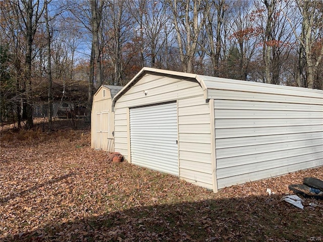 garage with a storage shed