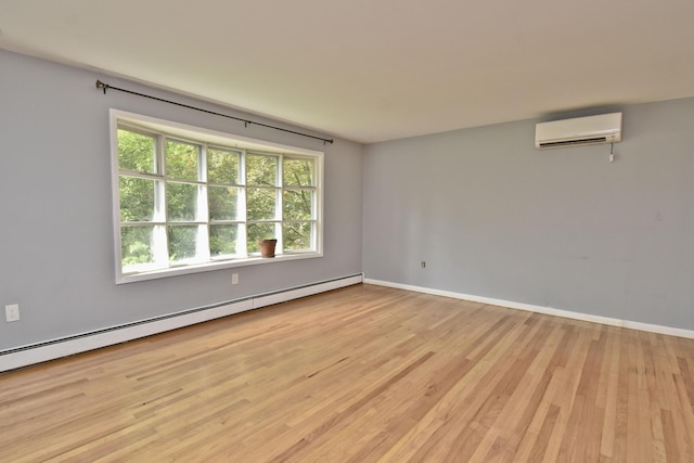207 Shepard Ave, Delaware Water Gap, PA 18327 - unfurnished room with a wall mounted AC, light wood-style flooring, baseboards, and baseboard heating
