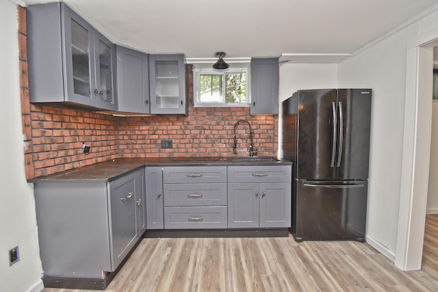 207 Shepard Ave, Delaware Water Gap, PA 18327 - kitchen featuring freestanding refrigerator, gray cabinets, dark countertops, and light wood-style flooring