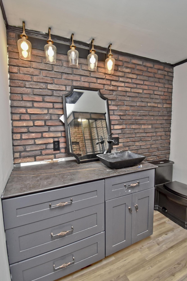 207 Shepard Ave, Delaware Water Gap, PA 18327 - bar with a sink, brick wall, and light wood finished floors