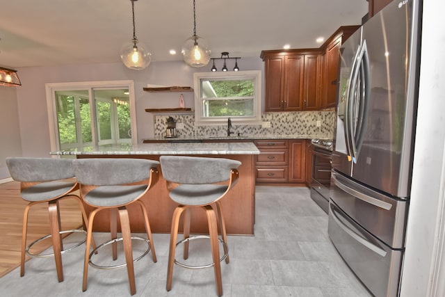 207 Shepard Ave, Delaware Water Gap, PA 18327 - kitchen featuring stainless steel appliances, a sink, plenty of natural light, a center island, and recessed lighting