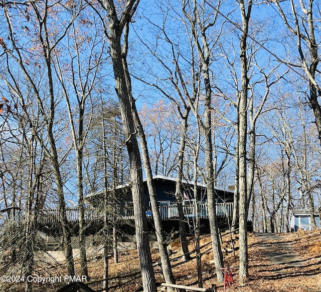 view of home's exterior with a deck