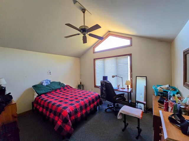 bedroom featuring lofted ceiling, carpet, and a ceiling fan