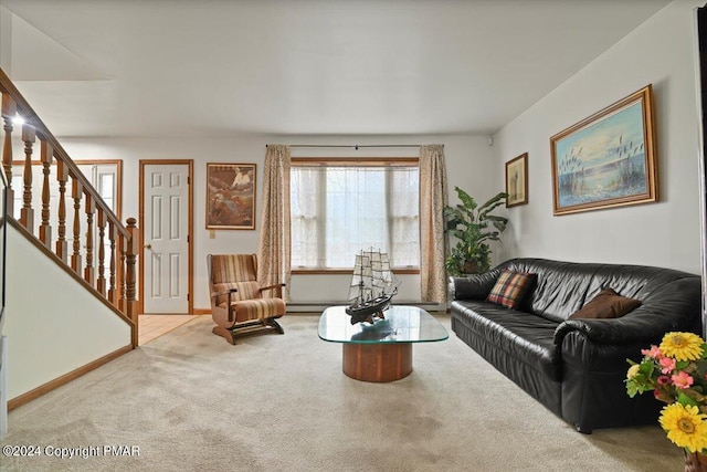 living area with carpet floors, stairs, and baseboards