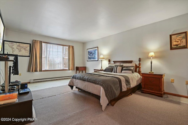 carpeted bedroom featuring a baseboard radiator and baseboards