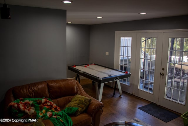 recreation room featuring recessed lighting, french doors, and wood finished floors