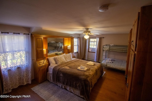 bedroom featuring ceiling fan and wood finished floors