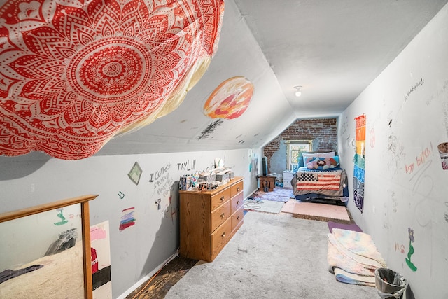 bedroom with lofted ceiling