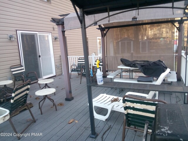 deck featuring a pergola