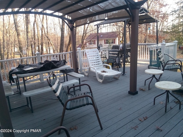 wooden terrace featuring a pergola