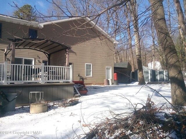 view of snow covered property