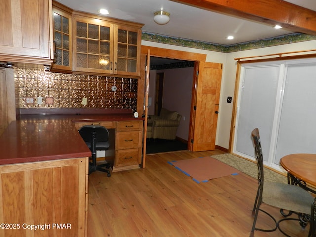 home office featuring baseboards, recessed lighting, and light wood-style floors