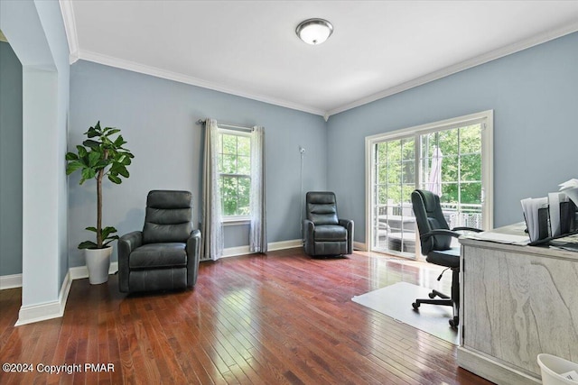 home office featuring hardwood / wood-style flooring, baseboards, and ornamental molding