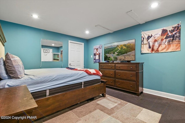 bedroom featuring recessed lighting and baseboards