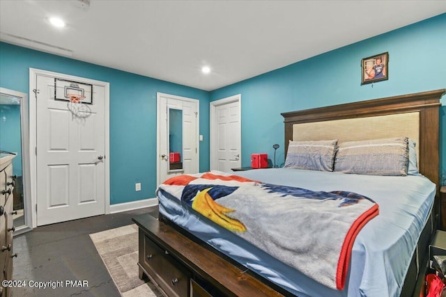 bedroom featuring recessed lighting and baseboards