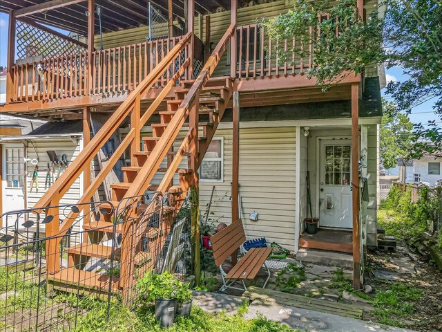 213 N St Fran Cabrini Ave, Scranton, PA 18504 - rear view of house with entry steps, stairway, and a wooden deck