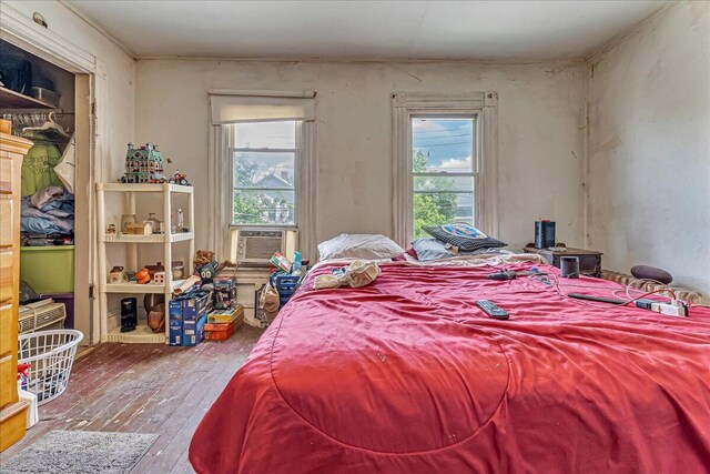 213 N St Fran Cabrini Ave, Scranton, PA 18504 - bedroom with hardwood / wood-style flooring, multiple windows, and cooling unit