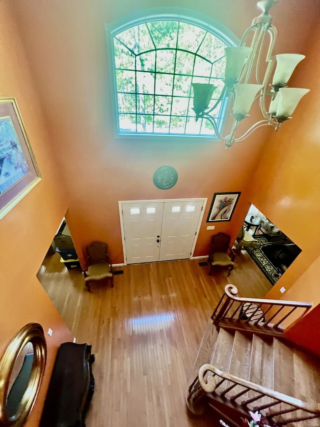 512 Bombur Ln, Tamiment, PA 18371 - foyer entrance with wood finished floors, a towering ceiling, and mail area