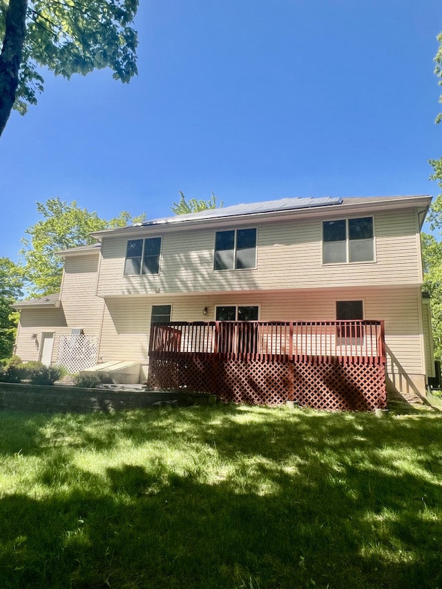512 Bombur Ln, Tamiment, PA 18371 - back of house featuring a deck and a lawn