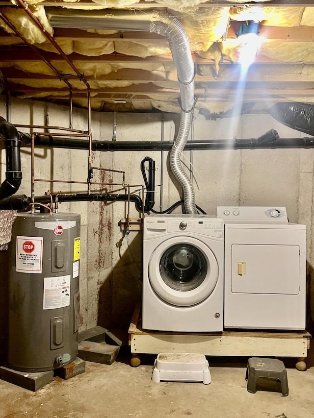 512 Bombur Ln, Tamiment, PA 18371 - washroom with water heater and independent washer and dryer