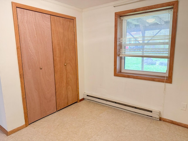 4751 Brentwood Dr, Tobyhanna, PA 18466 - unfurnished bedroom with baseboard heating, baseboards, a closet, and ornamental molding