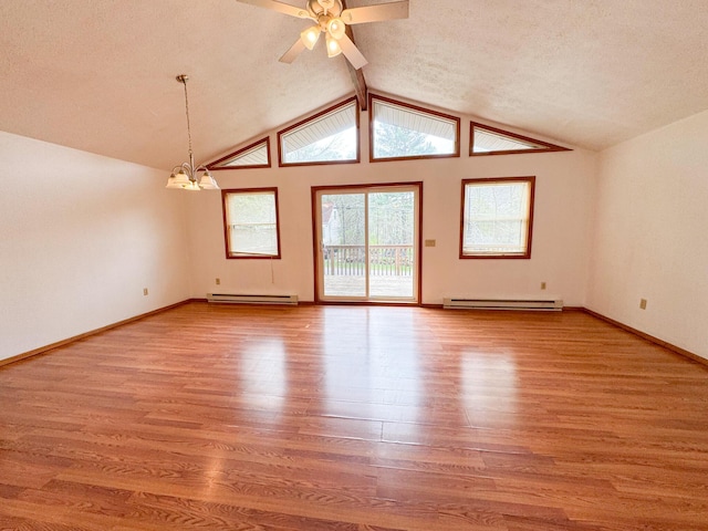 4751 Brentwood Dr, Tobyhanna, PA 18466 - unfurnished room featuring a baseboard radiator, a chandelier, wood finished floors, a ceiling fan, and lofted ceiling