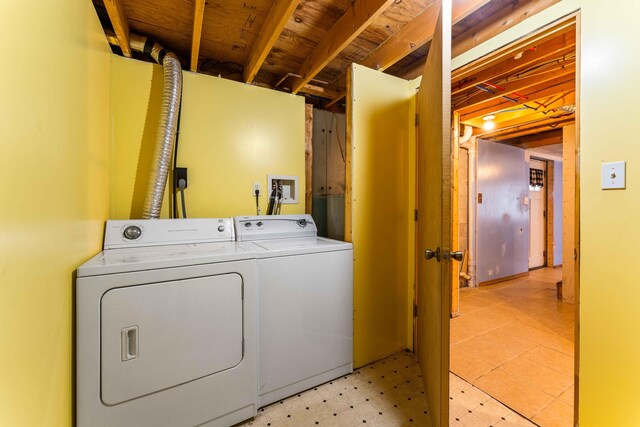 half bath featuring tile patterned flooring, visible vents, vanity, and toilet