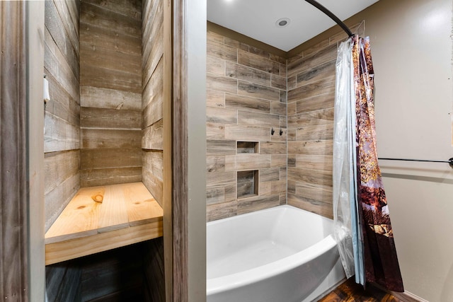 full bath with shower / bathtub combination with curtain