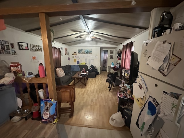 interior space with wood finished floors and a ceiling fan