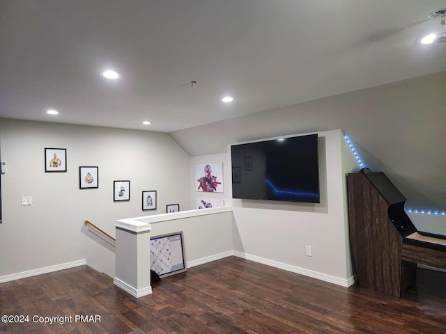 interior space featuring baseboards, dark wood-style flooring, and recessed lighting