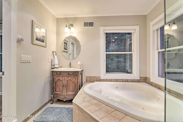 full bathroom with a jetted tub, vanity, visible vents, and crown molding