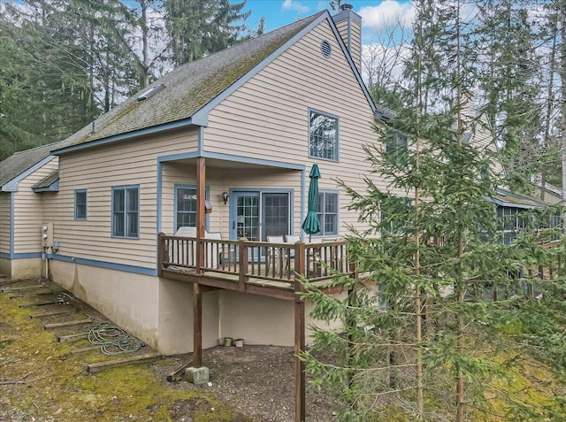 2181 Oak Hill Dr, Buck Hill Falls, PA 18323 - back of property with a chimney and a deck