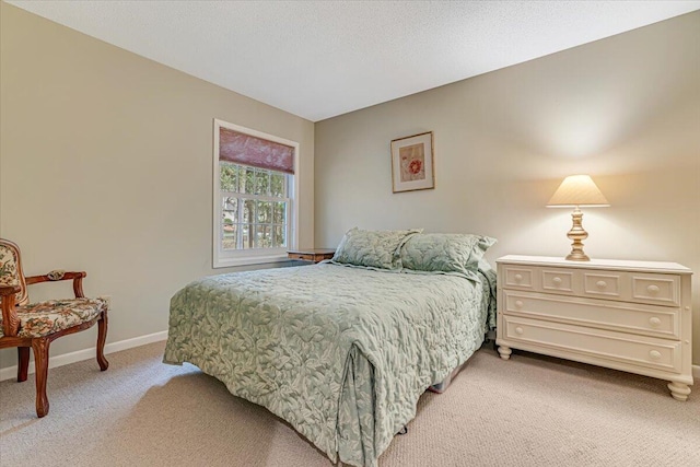 2181 Oak Hill Dr, Buck Hill Falls, PA 18323 - bedroom featuring baseboards and light colored carpet