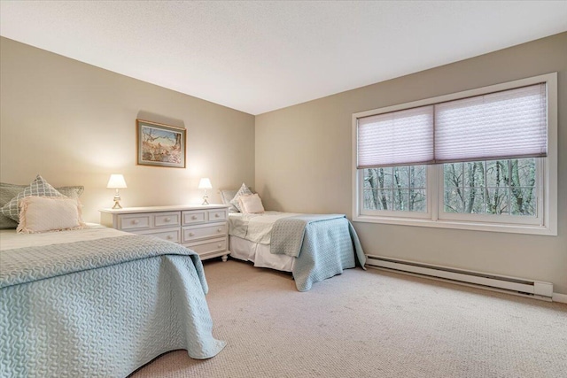 2181 Oak Hill Dr, Buck Hill Falls, PA 18323 - bedroom with light carpet and a baseboard heating unit