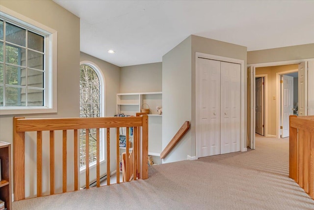 2181 Oak Hill Dr, Buck Hill Falls, PA 18323 - hall with an upstairs landing and carpet
