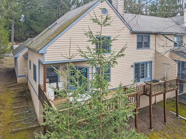 2181 Oak Hill Dr, Buck Hill Falls, PA 18323 - back of property featuring a deck and a chimney