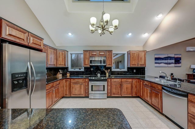 kitchen with a sink, brown cabinetry, tasteful backsplash, and stainless steel appliances