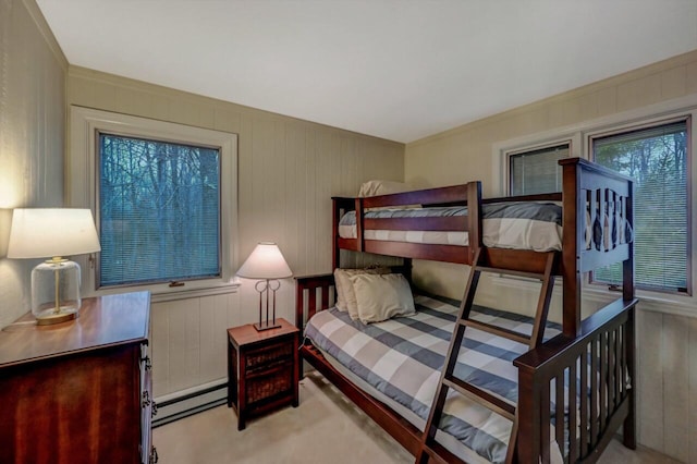 bedroom with a baseboard heating unit