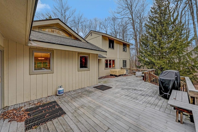 wooden deck with area for grilling