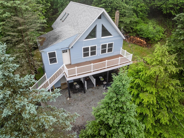 115 Tumbleweed Dr, Long Pond, PA 18334 - rear view of house with stairs, a chimney, a shingled roof, and a deck
