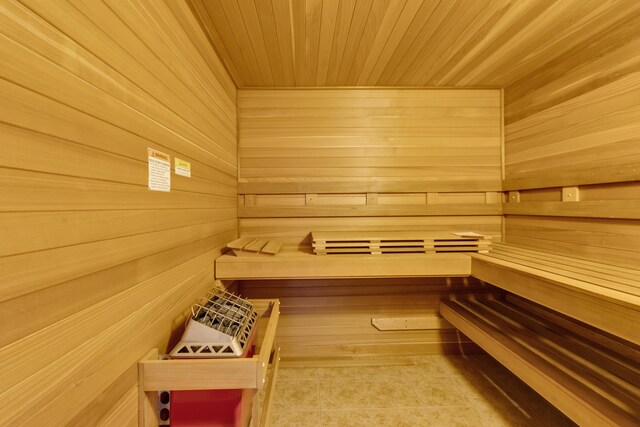 5194 S Hamilton S, Saylorsburg, PA 18353 - relaxing sauna / steam room featuring tile patterned flooring, wooden ceiling, and wooden walls
