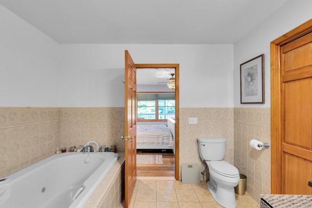 5194 S Hamilton S, Saylorsburg, PA 18353 - full bath featuring a jetted tub, tile patterned floors, a ceiling fan, ensuite bathroom, and a wainscoted wall