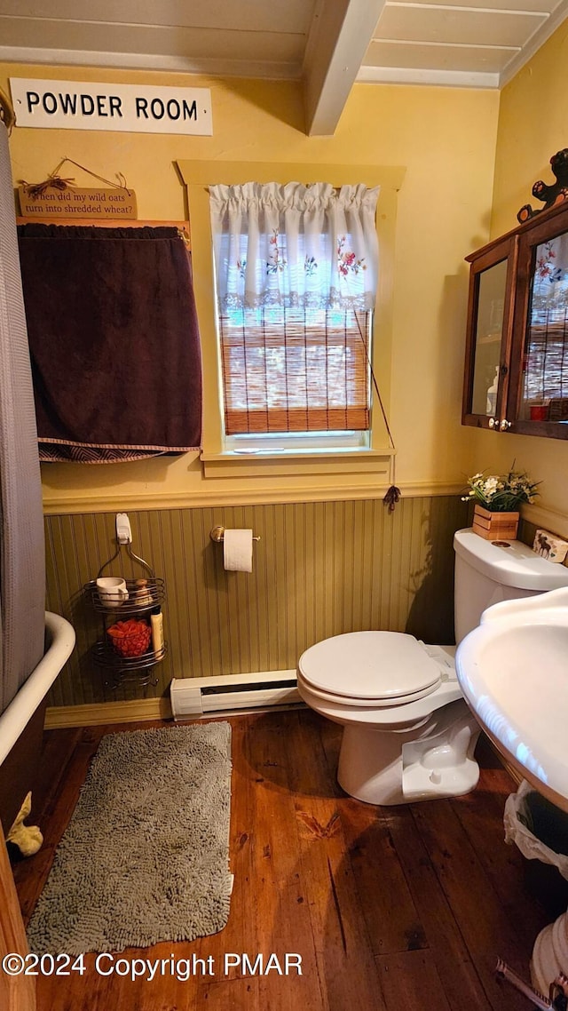 2124 Meadowlark Cir, Bushkill, PA 18324 - bathroom featuring crown molding, wainscoting, toilet, hardwood / wood-style flooring, and a baseboard radiator