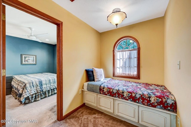 bedroom featuring carpet flooring and baseboards