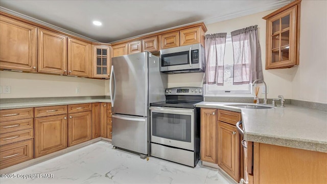 115 Aspen Cir E, Stroudsburg, PA 18302 - kitchen featuring appliances with stainless steel finishes, light marble finish flooring, brown cabinets, and recessed lighting