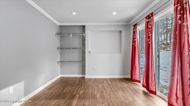 115 Aspen Cir E, Stroudsburg, PA 18302 - unfurnished bedroom featuring crown molding, wood finished floors, and recessed lighting