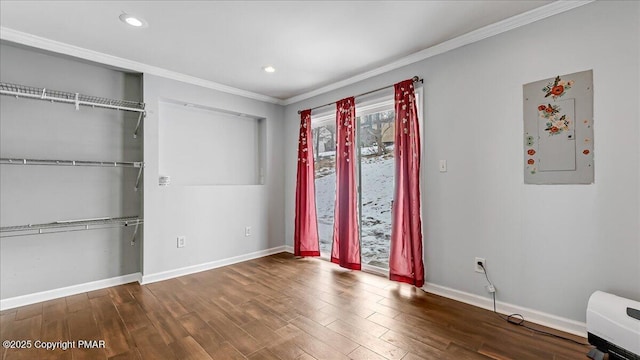 115 Aspen Cir E, Stroudsburg, PA 18302 - unfurnished bedroom featuring crown molding, wood finished floors, recessed lighting, and a closet